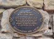 Beaumont Knitting Mill The historic Plaque says:  “Town of Halton Hills  Beaumont Knitting Mill  Joseph Tweedle ran a saw mill on this site in the 1860?s. The present building was built circa 1872 by Richard Hurst and purchased in 1882 by Samual Beaumont. The structure operated as a knitting mill until 1972.