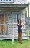 Shania Twang in front of an old bank